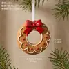 Nuevos adornos navideños transfronterizos, adornos colgantes, guirnaldas, casitas de jengibre DIY, colgantes navideños de resina de hombre de jengibre