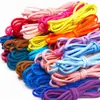 Banda elástica de nailon de color de 0,5 cm con núcleo de aceite redondo plano sólido, admite opciones de color personalizadas