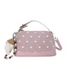 Bolso de mano de gamuza de moda estilo coreano, nicho elegante, nuevo para otoño 2026, bolso de hombro y cruzado con textura de lunares