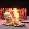 Pequeno sofá reclinável Maitreya ornamentos de lazer armário de TV doméstico decorações interessantes chinesas artesanato de resina fabricantes atacado