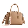 Bolso de mujer de estilo coreano, de nicho, con forma de concha, inspirado en el bowling, casual, versátil, se puede llevar en la mano, al hombro o cruzado, simple, elegante, moderno, bolso pequeño cuadrado