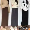Falda Negra de Tiro Alto con Estilo Maillard para Mujer, Colección Otoño 2026, Diseño Adelgazante con Abertura Trasera, Falda de Longitud Media