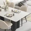 Mesa de comedor rectangular minimalista y juego de sillas, adecuado para apartamentos pequeños, moderno, simple y lujoso, una opción popular para el comedor del hogar