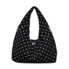 Bolso de mujer de lunares estilo coreano 2026, con un fresco estampado floral, un diseño juvenil y un estilo de bolso tote moderno, retro y chic