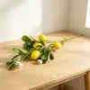 Venta al por mayor de fabricante de ramas individuales de limón artificial, 4 frutas falsas para arreglos florales caseros, decoración de ambiente de Año Nuevo, fruta de la fortuna