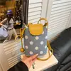 Bolso de Lunares de Diseño de Nicho para Mujer 2026 Estilo Nuevo Color Bloque Versátil Bolso Cruzado Exquisito Mini Bolso Cubo Bolso de Mano Pequeño