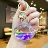 Llavero Creativo Serie Océano Relleno de Aceite Pez Payaso Estrella de Mar Pez Pequeño Colgante de Bolso Decoración de Llavero