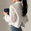 Corea del Sur nuevo coreano chic dulce y picante sentido del diseño nicho cintura alta abertura trasera sentido del diseño camisa de manga larga corta