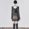 Fábrica transfronteriza Europa y Estados Unidos suelo de desecho viento falso dos piezas correa de cuello colgante manga larga camiseta chaqueta de chica caliente ropa de mujer tiembla Taobao