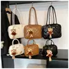 Bolsa de Bowling de Urso de Grande Capacidade 2024 Nova Bolsa de Mão Outono e Inverno Bolsa de Ombro Transversal Bolsa Boston