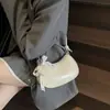 Bolso de axila de nicho coreano para mujer 2026 Nuevo de moda con encaje en forma de media luna Bolso de hombro simple
