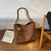 Bolso Tote Retro Mujer 2026 Nuevo Otoño Invierno Meilade Moda Simple Gran Capacidad para Viaje Diario Hombro Único Bajo el Brazo