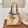 Bolsa de mão moderna estilo coreano para mulheres, nova coleção 2026, bolsa de ombro fashion e de grande capacidade, bolsa tote versátil para estudantes, adequada para escola e trajeto