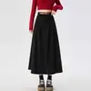 Saia midi de veludo cotelê retrô da moda para mulheres, novo estilo coreano outono e inverno 2026, saia evasê que cobre o quadril