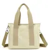Bolsa de lona estilo bosque con múltiples compartimentos, bolsa tote pequeña estilo japonés ins para mujer, para estudiantes, para ir al trabajo y al día a día, se puede llevar cruzada