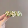 Clip para el Cabello de Flor de Concha de Perla Nuevo Primavera 2026 Mediano con Pedrería Pinza de Resorte Elegante Clip para Cola de Caballo