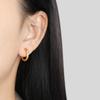 Pendientes de alta calidad con hebilla de oreja estrellada con patrón de martillo simple de estilo europeo y americano para mujer