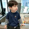 Camiseta de manga larga de dos piezas de imitación para niños, nuevo modelo de principios de otoño 2026, top de algodón puro para primavera y otoño, camiseta interior para niños mayores