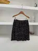Falda retro floral coreana para mujer, falda corta negra de cintura alta adelgazante versátil de línea A, falda corta floral arrugada