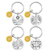 Llavero europeo y americano transfronterizo girasol anima llavero de acero inoxidable para enviar a niños a novias con letras de regalo a mano