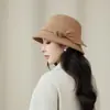 Sombrero tipo cubo de lana de alta calidad para mujer en otoño e invierno, con un elegante diseño de lazo, perfecto para madres y que ofrece un aspecto favorecedor, estiliza el rostro y es cálido