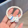 Lazo para el pelo de cachorro a cuadros de dibujos animados lindo estilo japonés Cuerda para el pelo de chica Macaron Ins Accesorio para el pelo dulce de pareja Diadema