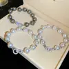 Pulsera de Perlas y Circonita Cúbica Retro Francesa Lujo Ligero Gama Alta Exquisita Cadena de Mano Estilo Elegante de Nicho Versátil para el Viaje Joyería de Mano
