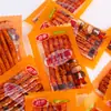 Dr. Tiras picantes de tendón de res Jin Feng caja completa 50 paquetes de rodajas picantes nostálgicas de la infancia palo gluten doble picante snacks de Henan