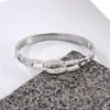 Nova Pulseira de Aço Inoxidável para Comércio Exterior, Anéis Interligados, Cravejada com Diamantes, Temperamento de Luxo Leve Feminino, Design Aberto, Pulseira de Titânio Versátil