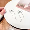 Brincos de laço novos de verão 2021, temperamento feminino, brincos de franja de alto padrão, brincos femininos longos, uma geração de cabelo