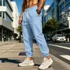 Pantalones versátiles de algodón y lino para hombre, nuevos, transfronterizos europeos y americanos, cintura elástica, corte holgado, color liso, transpirables, con puño