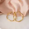 Pendientes Transfronterizos para Mujer, Lujo Ligero, Diseño de Alta Gama, Estilo de Nicho, Aros Exagerados para Rostros Cuadrados y Redondos, Círculos Grandes Lisos