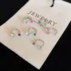 Tachinhas Coloridas Flash de Aço Titânio para Orelha Óssea para Mulheres com Furos Duplos na Orelha, Brincos de Piercing de Orelha de Alta Qualidade