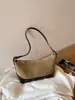 Bolso hobo de mezclilla azul vintage para mujer 2025 nuevo nicho patchwork de un solo hombro color block tipo almohada versión coreana