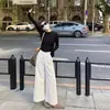 Entrega en una sola pieza cuello alto básico camisa interior para mujer otoño e invierno cálida cepillada ajustada camiseta de manga larga negra