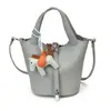 2026 Verão Estilo Coreano Moda Bolsa de Mão Estilo Balde Feminina Simples Elegante Bolsa de Ombro Bolsa Transversal Feminina de Nicho