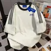 Diseño de Estilo Coreano con Colores Contrastantes y Tres Rayas, Camiseta de Manga Corta para Hombres y Mujeres, Nuevo Modelo Verano 2025, Top Holgado y Versátil