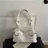 Bolsa Boston texturizada versátil de ombro e de mão, nova tendência de moda alta verão 2026, com tachas retrô