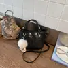 Bolso cubo de moda y sencillo para mujer, gran capacidad, nuevo de la primavera 2026, elegante estilo vintage, para el trabajo y los desplazamientos, bolso de hombro