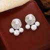 Pendientes elegantes de plata 925, de lujo, de alta gama, estilo nicho, de moda, con textura de metal y perla.
