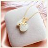 Collar de calabaza de alta calidad, colgante de jade blanco de imitación de la suerte, cadena de clavícula femenina, joyería de acero de titanio de marca de nicho de lujo ligera de celebridades de Internet