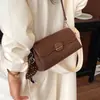 Bolso mujer estilo nuevo sensación cotidiana oblicuo otoño invierno bandolera moda un solo hombro versátil para el día a día 2026 axila bolso de mano felpa gamuza
