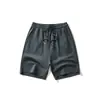 Ropa de hombre transfronteriza estilo japonés 2026 verano dobladillo dividido deportivo casual holgado texturizado pantalones de longitud media para hombre al por mayor