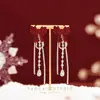 Pendientes Rojos de Año Nuevo Otoño e Invierno una Cadena de Carrillones de Viento Afelpados Pendientes de Flor Borla de Boda de Año Nuevo Pendientes de Gama Alta para Mujer