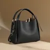 Bolso tipo cesta de piel Togo, bolso de mano de cuero genuino de lujo ligero para mujer, gran capacidad, sensación de alta gama, bolso cruzado tipo cubo de nicho