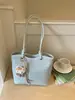 Bolso tipo cubo con patrón tejido de moda, bolso cruzado único y moderno, estilo coreano, elegante para el trabajo y los desplazamientos, bolso de mano casual