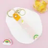 Llavero Colgante de Cordón de Cuero con Letra Transparente Brillante con Accesorios Estilo Muñeca Rellena de Aceite Encanto de Llavero Pulsera Venta al por Mayor