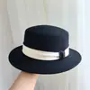 Nuevo Sombrero de Copa Negro Retro Francés Satín Copa Plana Ala Plana Ala Ancha Lana Sombrero Cálido para Mujer Otoño e Invierno