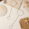 Cadena de dedos de moda transfronteriza estilo INS, pulsera de cadena de anillo de circonita chapada en oro real de cobre, joyería personalizada de moda al por mayor para mujeres