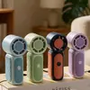 Nuevo modelo de mini ventilador portátil de mano para viento fuerte con correa, 5 velocidades, diseño elegante, batería de larga duración, ventilador de escritorio recargable por USB